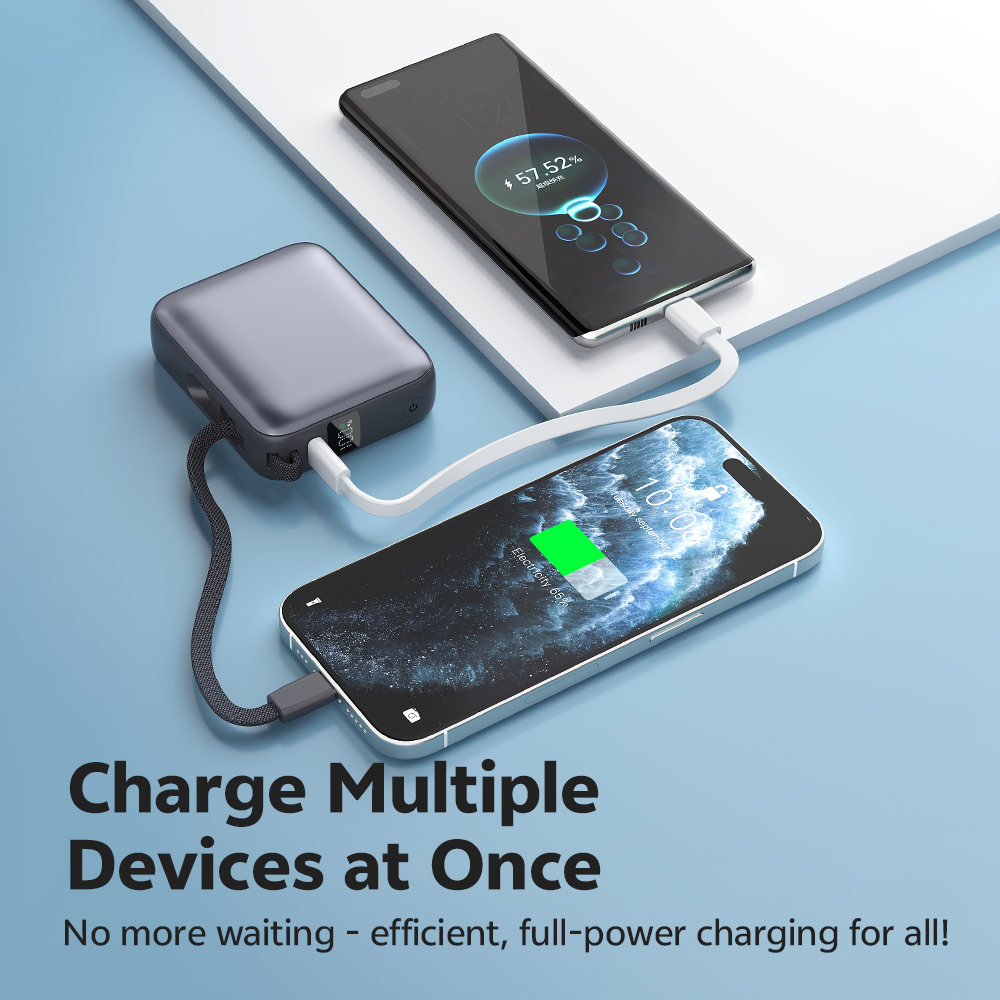 White QCY PB10C charging multiple devices at once, two phones connected, 35W efficient output.